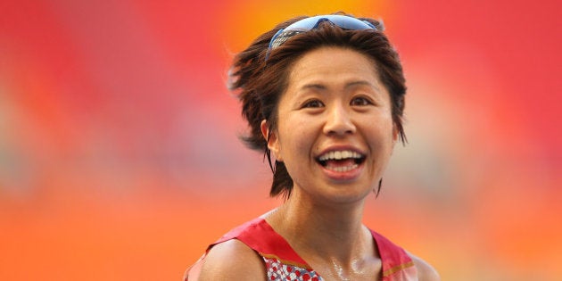 MOSCOW, RUSSIA - AUGUST 10: Kayoko Fukushi of Japan reacts after winning bronze in the Women's Marathon during Day One of the 14th IAAF World Athletics Championships Moscow 2013 at Luzhniki Stadium on August 10, 2013 in Moscow, Russia. (Photo by Julian Finney/Getty Images)