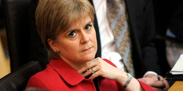 Scotland's First Minister Nicola Sturgeon listens in the chamber on the second day of the 'Scotland's Choice' debate on a motion to seek the authority to hold an indpendence referendum, at the Scottish Parliament in Edinburgh, on March 28, 2017.The vote in Scotland's parliament on supporting First Minister Nicola Sturgeon's call for a new independence referendum resumed Tuesday, aftering it was delayed in a gesture of respect following the March 22 attack on the British parliament. / AFP PHOTO / POOL / Andy Buchanan (Photo credit should read ANDY BUCHANAN/AFP/Getty Images)