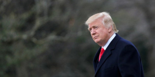 U.S. President Donald Trump walks on the South Lawn of the White House before his departure to Louisville, Kentucky, in Washington U.S., March 20, 2017. REUTERS/Carlos Barria