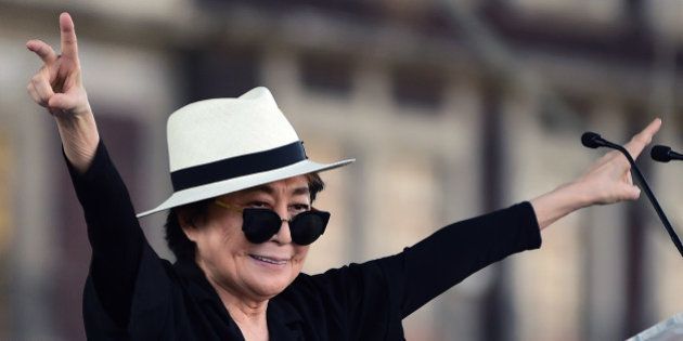 Japanese musician and artist Yoko Ono, widow of John Lennon, waves before an event of the Secretary of Cultura at Zocalo Square in Mexico City, on February 2, 2016. Yoko Ono is in Mexico for diverse activities. AFP PHOTO/ALFREDO ESTRELLA / AFP / ALFREDO ESTRELLA (Photo credit should read ALFREDO ESTRELLA/AFP/Getty Images)