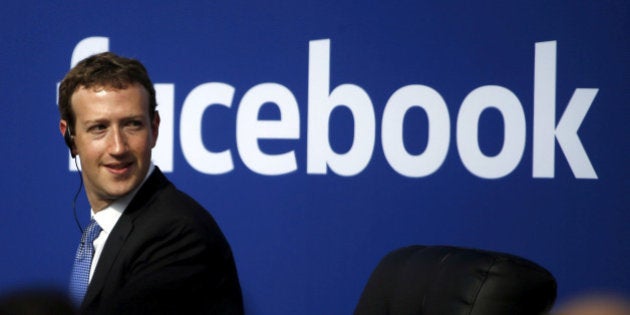 Facebook CEO Mark Zuckerberg is seen on stage during a town hall at Facebook's headquarters in Menlo Park, California September 27, 2015. REUTERS/Stephen Lam/File Photo