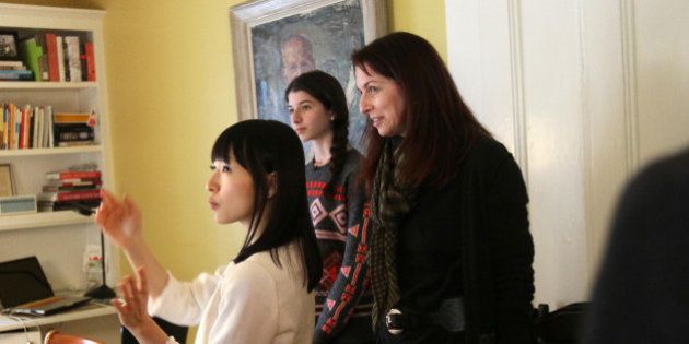 CAMBRIDGE, MA - FEBRUARY 5: Marie Kondo, zen tidiness guru speaks in Japanese through an interpreter tells Claduia Logan and her daughter Otti,16, there is much joy in their dining room/ office. (Photo by Joanne Rathe/The Boston Globe via Getty Images)