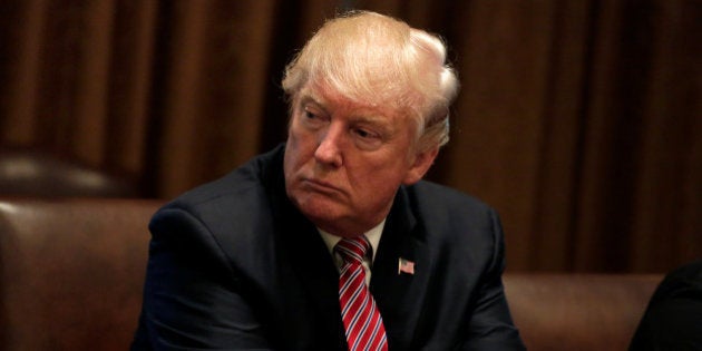 U.S. President Donald Trump meets with immigration crime victims at the White House in Washington, U.S., June 28, 2017. REUTERS/Yuri Gripas