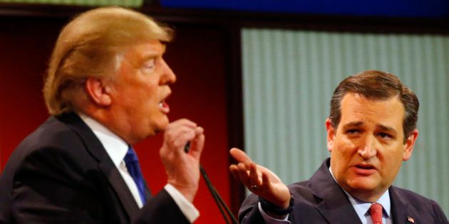 Republican presidential candidates, businessman Donald Trump and Sen. Ted Cruz, R-Texas, argue a point during a Republican presidential primary debate at Fox Theatre, Thursday, March 3, 2016, in Detroit. (AP Photo/Paul Sancya)