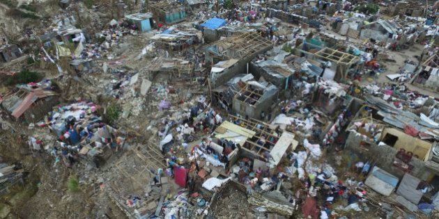 Buildings destroyed and damaged by Hurricane Matthew are seen in Jeremie, in western Haiti, on October 7, 2016.The full scale of the devastation in hurricane-hit rural Haiti became clear as the death toll surged over 400, three days after Hurricane Matthew leveled huge swaths of the country's south. / AFP / Nicolas GARCIA (Photo credit should read NICOLAS GARCIA/AFP/Getty Images)