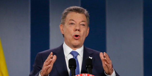 Colombiaâs President Juan Manuel Santos delivers a statement to the press after meeting with former President Alvaro Uribe and other opposition leaders at the presidential palace in Bogota, Colombia, Wednesday, Oct. 4, 2016. Uribe was a vocal critic of a peace deal signed between the Colombian government and rebels of the Revolutionary Armed Forces of Colombia, FARC, and led a successful campaign for voters that narrowly reject the deal in a referendum, delivering a major setback to Santos. (AP Photo/Fernando Vergara)