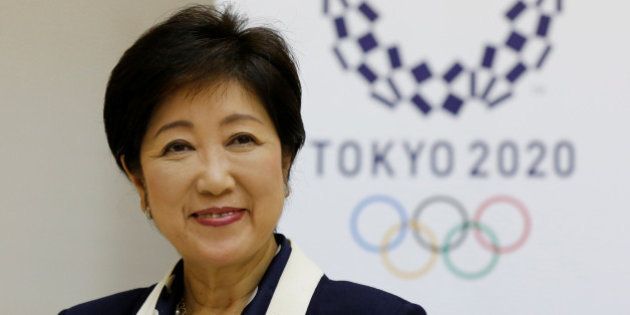 Tokyo Governor Yuriko Koike speaks in front of Tokyo 2020 Olympics emblem during an interview with Reuters at Tokyo Metropolitan Government Building in Tokyo, Japan, October 12, 2016. REUTERS/Toru Hanai