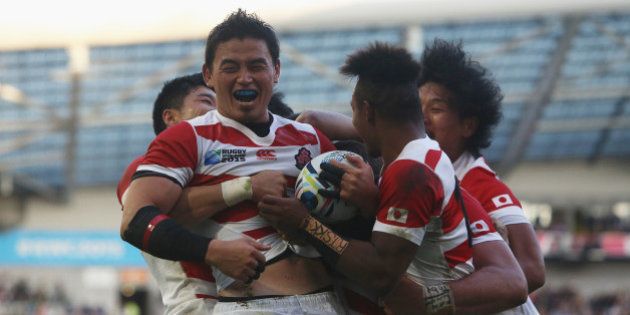 BRIGHTON, ENGLAND - SEPTEMBER 19: Ayumu Goromaru of Japan celebrates scoring the second try for Japan during the 2015 Rugby World Cup Pool B match between South Africa and Japan at the Brighton Community Stadium on September 19, 2015 in Brighton, United Kingdom. (Photo by Charlie Crowhurst/Getty Images)