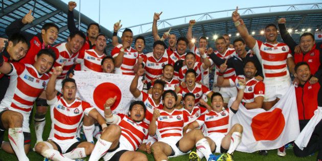 BRIGHTON, ENGLAND - SEPTEMBER 19: Japan players after the win over South Africa during the Rugby World Cup 2015 Pool B match between South Africa and Japan at Brighton Community Centre on September 19, 2015 in Brighton, England. (Photo by Steve Haag/Gallo Images)
