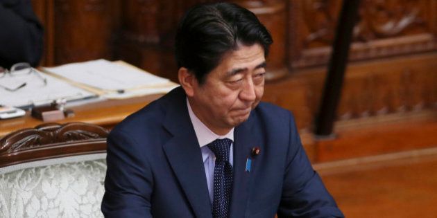 Japanese Prime Minister Shinzo Abe attends the upper house plenary diet session in Tokyo Friday, Sept. 18, 2015 after a censure motion against him was filed by an opposition party in their attempt to block contentious security bills that Abe's ruling party is eager to get final approval by the upper house. The bills would ease restrictions on what the military can do, a highly sensitive issue in a country where many take pride in the postwar pacifist constitution. (AP Photo/Koji Sasahara)
