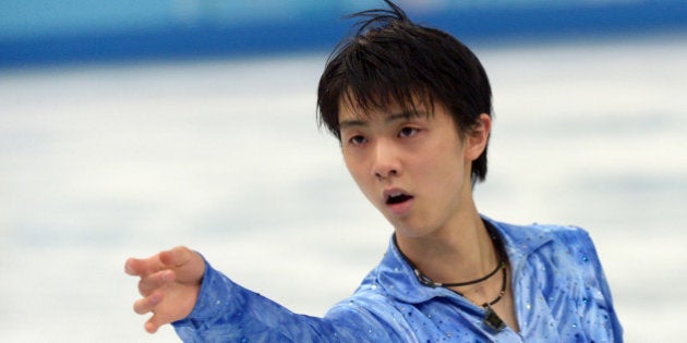 Japan's Yuzuru Hanyu performs in the Men's Figure Skating Team Short Program at the Iceberg Skating Palace during the Sochi Winter Olympics on February 6, 2014. AFP PHOTO / DAMIEN MEYER (Photo credit should read DAMIEN MEYER/AFP/Getty Images)