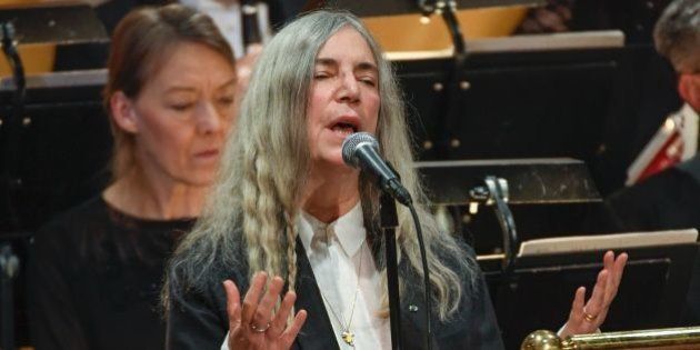 US singer Patti Smith performs 'A Hard Rain's A-Gonna Fall' by absent Literature prize winner Bob Dylan during the awardings of the Nobel Prizes in medicine, economics, physics and chemistry on December 10, 2016 in Stockholm, Sweden.Nobel laureates are honoured every year on December 10 -- the anniversary of the death of prize's founder Alfred Nobel, a Swedish industrialist, inventor and philanthropist. / AFP / TT News Agency / JESSICA GOW / Sweden OUT (Photo credit should read JESSICA GOW/AFP/Getty Images)