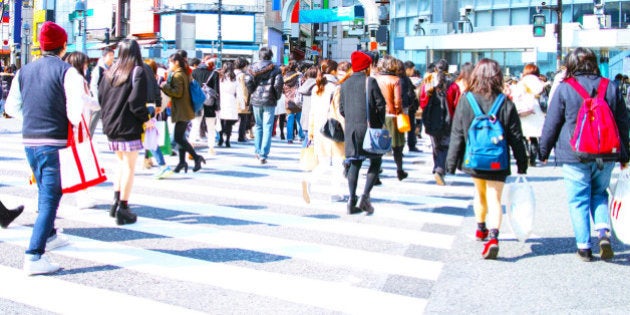 Crowd walking crosswalk