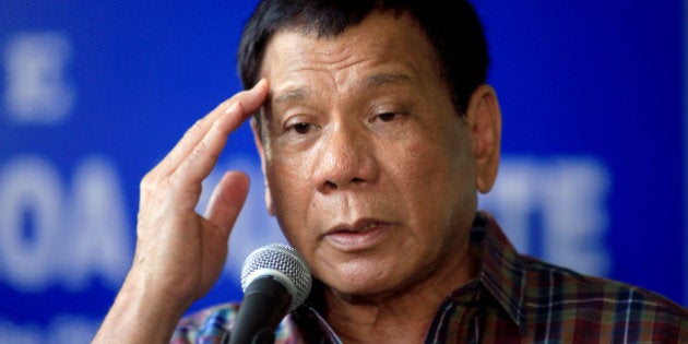 Philippines' President Rodrigo Duterte answer questions during a press briefing after awarding wounded soldiers, who fight against the insurgents of the Maute group, which has taken over large parts of the Marawi city, during his visit at the military camp hospital in Cagayan De Oro, Philippines June 11, 2017. REUTERS/Romeo Ranoco