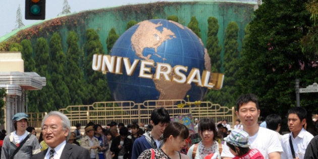 Visitors enjoy a tour at the movie theme park Universal Studios Japan (USJ) in Osaka on May 10, 2012. USJ unveiled plans to build the first international version of the theme park 'Wizarding World of Harry Potter' in Osaka. AFP PHOTO / YOSHIKAZU TSUNO (Photo credit should read YOSHIKAZU TSUNO/AFP/GettyImages)