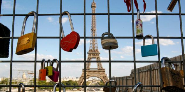 PARIS, FRANCE - SEPTEMBER 01: Love padlocks are seen in front of the Eiffel tower on September 1, 2016 in Paris, France. The accumulation of 'love locks', is a popular phenomenon in many European cities, where couples attach a lock to symbolize their love. (Photo by Chesnot/Getty Images)