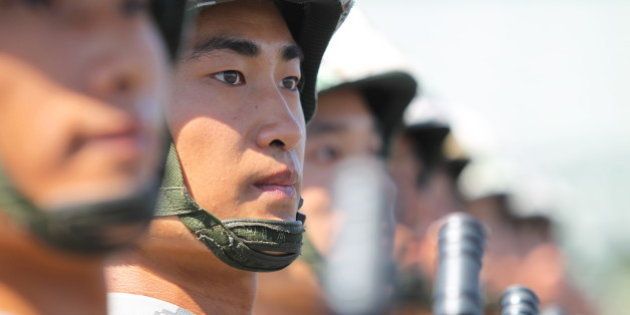 BEIJING, CHINA - AUGUST 22: (CHINA OUT) Soldiers of Chinese People's Liberation Army attend a training session for the September 3 military parade to mark the 70th anniversary of the victory of the Chinese People's War of Resistance Against Japanese Aggression at a military base on August 22, 2015 in Beijing, China. (Photo by ChinaFotoPress/ChinaFotoPress via Getty Images)
