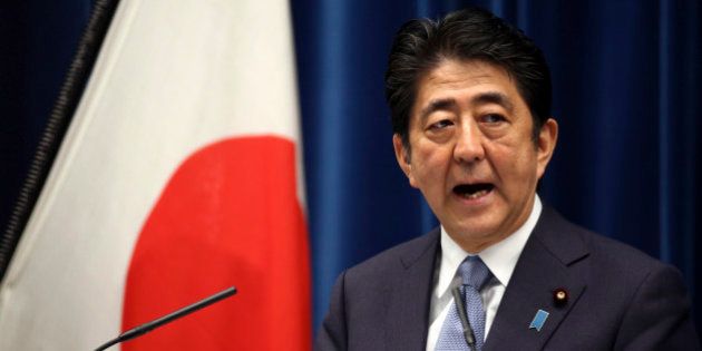 Japanese Prime Minister Shinzo Abe delivers a statement to mark the 70th anniversary of the end of World War II during a press conference at his official residence in Tokyo Friday, Aug. 14, 2015. Abe has expressed