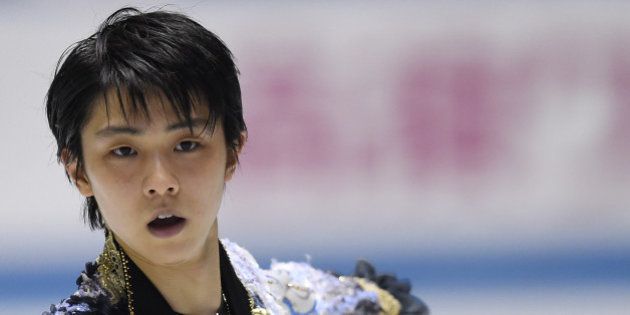 TOKYO, JAPAN - APRIL 17: Yuzuru Hanyu of Japan competes in the men's free skating during the day two of the ISU World Team Trophy at Yoyogi National Gymnasium on April 17, 2015 in Tokyo, Japan. (Photo by Atsushi Tomura/Getty Images)
