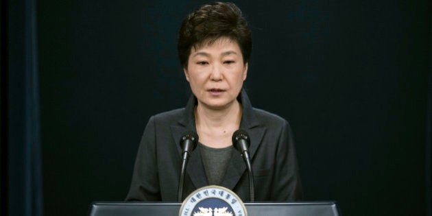 FILE - In this Friday, Nov. 4, 2016, file photo, South Korean President Park Geun-hye speaks during an address to the nation, at the presidential Blue House in Seoul, South Korea. In only a few days, South Korea's biggest scandal in years has done what six decades of diplomacy and bloodshed couldnât, uniting the rival Koreas, at least in one area: indignation against South Koreaâs leader. North Korean propaganda regularly attacks South Korean President Park Geun-hye. Many South Koreans now seem to be reaching Pyongyang levels of fury over an investigation into whether Park allowed a longtime confidante to manipulate her administration from the shadows. (Ed Jones/Pool Photo via AP, File)