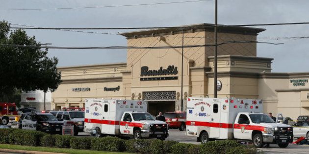 HOUSTON, TX - SEPTEMBER 26: Ambulance crews on standby after a gunman went on a shooting rampage wounding nine before he was shot and killed by police on September 26, 2016 in Houston, Texas. Three victims have been transported to Southwest Memorial Hospital, one has been taken to Ben Taub General Hospital and two have been transported to Memorial Hermann - Texas Medical Center. (Photo by Bob Levey/Getty Images)