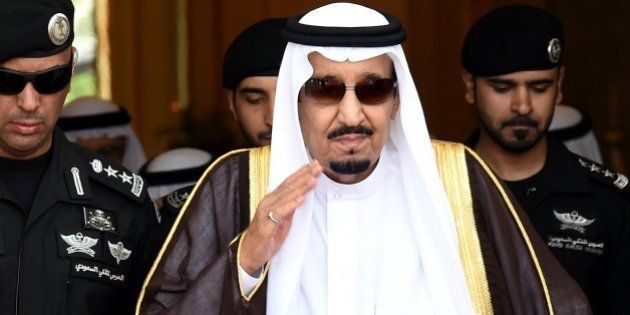 Saudi King Salman bin Abdulaziz (C) walks out to receive Sheikh Mohammed Bin Rashid al-Maktoum, ruler of Dubai (unseen) upon his arrival to attend the Gulf Cooperation Council (GCC) summit in Riyadh on May 5, 2015. AFP PHOTO / FAYEZ NURELDINE (Photo credit should read FAYEZ NURELDINE/AFP/Getty Images)