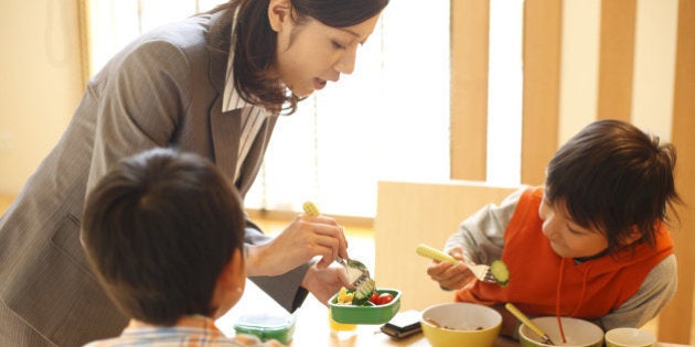 Mother preparing a lunchbox