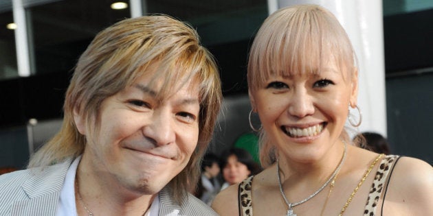 SAITAMA, JAPAN - MAY 31: Musicians Tetsuya Komuro (L) and KEIKO walk the red carpet during the MTV Video Music Awards Japan 2008 at the Saitama Super Arena on May 31, 2008 in Saitama, Japan. (Photo by Jun Sato/WireImage)