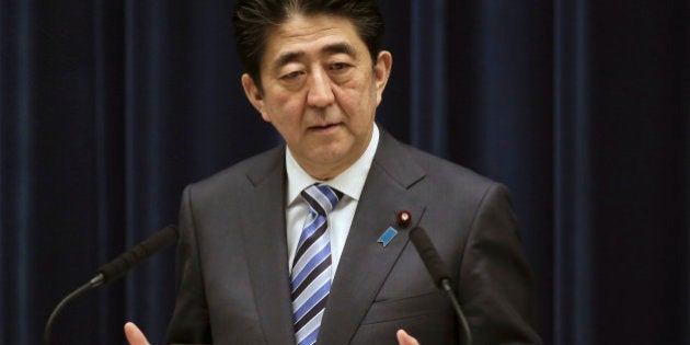 FILE - In this March 10, 2015 file photo Japanese Prime Minister Shinzo Abe speaks during a news conference at his official residence in Tokyo. Abe will become the first Japanese prime minister to address a joint meeting of Congress in late April, the House speaker has announced. Foreign leaders have been accorded the honor 111 times since World War II, but not Japan, despite the tight alliance forged with the U.S. in the 70 years since 1945. (AP Photo/Eugene Hoshiko, File)