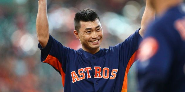 Jun 11, 2017; Houston, TX, USA; Houston Astros left fielder Norichika Aoki (3) waves to the crowd after hitting a single during the sixth inning against the Los Angeles Angels at Minute Maid Park. The hit gives Aoki 2000 combined hits between MLB and Nippon Professional Baseball. Mandatory Credit: Troy Taormina-USA TODAY Sports