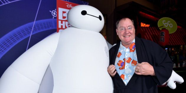 HOLLYWOOD, CA - NOVEMBER 04: Chief Creative Officer at Pixar, Walt Disney Animation Studios and DisneyToon Studios John Lasseter (R) with character Baymax attends the Los Angeles Premiere of Walt Disney Animation StudiosÂ ÂBig Hero 6' at El Capitan Theatre on November 4, 2014 in Hollywood, California. (Photo by Alberto E. Rodriguez/Getty Images for Disney)