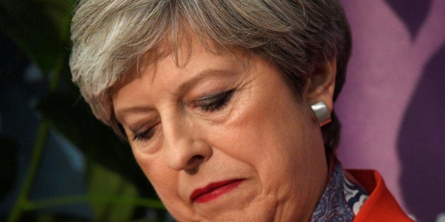 Britain's Prime Minister Theresa May waits for the result of the vote in her constituency at the count centre for the general election in Maidenhead, June 9, 2017. REUTERS/Toby Melville TPX IMAGES OF THE DAY