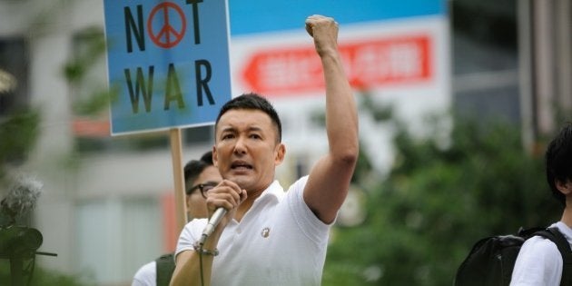 TOKYO, JAPAN - JUNE 27 : Yamamoto Taro of People's Life Party attends a rally protest in Tokyo Shibuya District, Japan, on June 27, 2015, to stand together against the change of the Japan Security Policy and the Pacifist Constitution of Japan. (Photo by David Mareuil/Anadolu Agency/Getty Images)