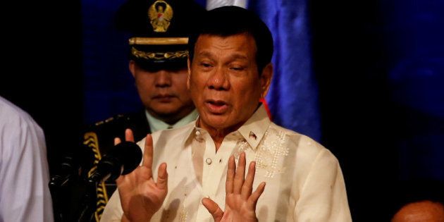 Philippines President Rodrigo Duterte speaks to members of the Filipino community in Jakarta, Indonesia September 9, 2016. REUTERS/Darren Whiteside