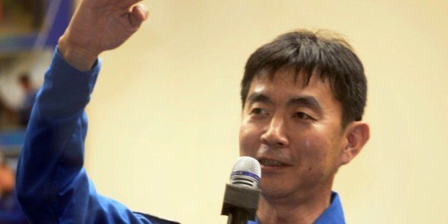 The Soyuz TMA-17M spacecraft crew member Japanese astronaut Kimiya Yui talks to media during a preflight press conference at the Russian-leased Baikonur cosmodrome in Kazakhstan on July 21, 2015. Russia's Soyuz TMA-17M spacecraft with two other members - US astronaut Kjell Lindgren, and Russian cosmonaut Oleg Kononenko is scheduled to blast off to the ISS from early on July 23, 2015. AFP PHOTO / ALEXANDER NEMENOV (Photo credit should read ALEXANDER NEMENOV/AFP/Getty Images)