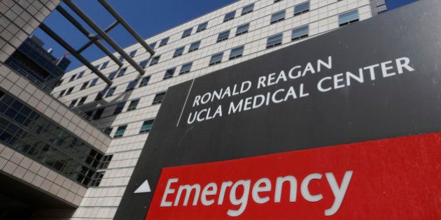 FILE - In this Feb. 19, 2015, file photo, The Ronald Reagan UCLA Medical Center building is seen in Los Angeles. UCLA's hospital officials say information on as many as 4.5 million individuals stored on servers was accessed during cyber-attacks beginning last year. UCLA Health said in a statement Friday, July 17, 2015, that while there's no evidence that hackers acquired personal or medical data, it can't be immediately ruled out. (AP Photo/Damian Dovarganes, File)