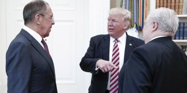 WASHINGTON, D.C., USA - MAY 10, 2017: Russia's Foreign Minister Sergei Lavrov, US President Donald Trump, and Russian Ambassador to the United States Sergei Kislyak (L-R) talking during a meeting in the Oval Office at the White House. Alexander Shcherbak/TASS (Photo by Alexander Shcherbak\TASS via Getty Images)