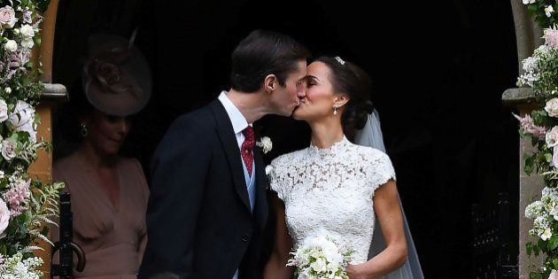 Pippa Middleton kisses her new husband James Matthews, following their wedding ceremony at St Mark's Church in Englefield, west of London, on May 20, 2017. REUTERS/Justin Tallis/Pool