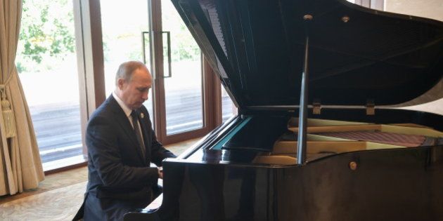 BEIJING, CHINA - MAY 14, 2017: Russias President Vladimir Putin plays the grand piano ahead of a meeting with China's President Xi Jinping at the Diaoyutai State Guesthouse. Alexei Nikolsky/Russian Presidential Press and Information Office/TASS (Photo by Alexei Nikolsky\TASS via Getty Images)