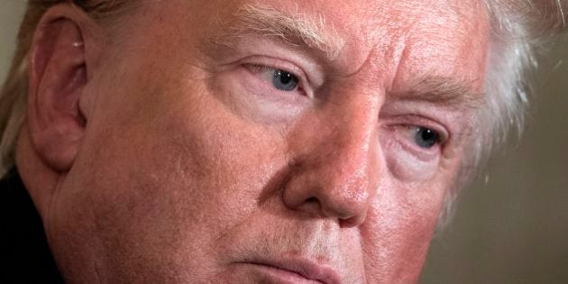 US President Donald Trump listens during a press conference with Colombia's President Juan Manuel Santos in the East Room of the White House May 18, 2017 in Washington, DC. / AFP PHOTO / Brendan Smialowski (Photo credit should read BRENDAN SMIALOWSKI/AFP/Getty Images)