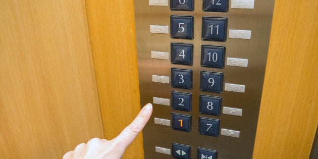 The moment of hitting a button when I'm on the elevator. POV.