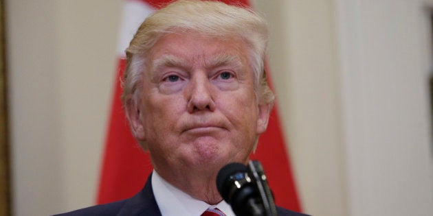 U.S President Donald Trump listens to Turkey's President Recep Tayyip Erdogan as they give statements to reporters in the Roosevelt Room of the White House in Washington, U.S. May 16, 2017. REUTERS/Kevin Lamarque