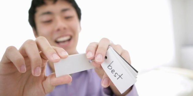 Japanese young man remembering English word