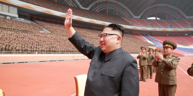 North Korean leader Kim Jong Un waves to the members of the Korean People's Army in this undated photo...