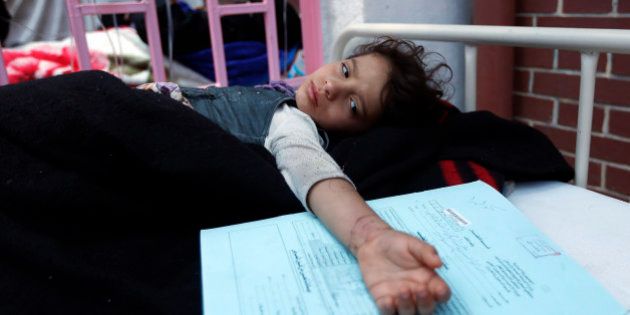 A Yemeni child suspected of being infected with cholera receives treatment at a hospital in Sanaa on May 6, 2017.At least 570 suspected cases of cholera have surfaced in war-torn Yemen in the past three weeks, sparking fears of a potential epidemic, Doctors Without Borders said. Healthcare has dramatically deteriorated in Yemen as conflict between Iran-backed rebels and the Saudi-supported government continues to escalate, leaving hospitals destroyed and millions struggling to find access to food and clean water. / AFP PHOTO / Mohammed HUWAIS (Photo credit should read MOHAMMED HUWAIS/AFP/Getty Images)