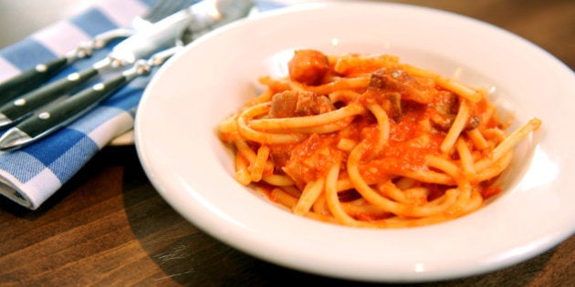 12 Jan 2011. horizontal photo of chef Rocco Agostino with his restaurant interior as backdrop, plus a closeup shot of his dish, bucatini all'amatriciana. Photo Keith Beaty. (Photo by Keith Beaty/Toronto Star via Getty Images)