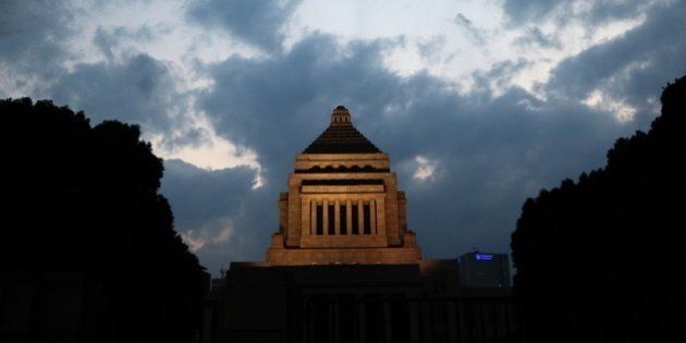 The National Diet building is illuminated during dusk in Tokyo on September 19, 2015 after Japan's Prime...