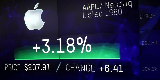 An electronic screen displays the Apple Inc. stock price at the Nasdaq Market Site in New York City, New York, U.S., August 2, 2018. REUTERS/Mike Segar