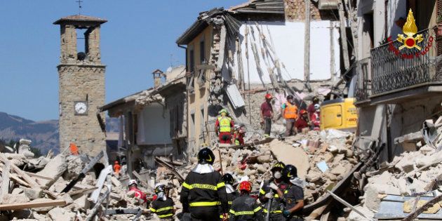 Rescuers work amid collapsed building in Amatrice, central Italy, Thursday, Aug. 25, 2016. Rescue crews raced against time Thursday looking for survivors from the earthquake that leveled three towns in central Italy and Italy once again anguished over trying to secure its medieval communities built on seismic lands. (Italian Firefighters Vigili del Fuoco via AP)