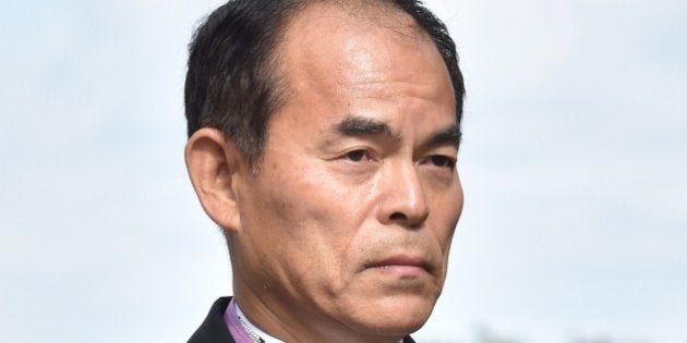 University of California, Santa Barbara professor Shuji Nakamura, Physics Nobel Prize laureate in 2014, poses during a photo session after the award ceremony of the Order of Culture at the Imperial Palace in Tokyo on November 3, 2014. Hiroshi Amano and Shuji Nakamura, two of the three winners of the 2014 Nobel Prize in Physics, and five other were awarded the Order of Culture for this year. AFP PHOTO / KAZUHIRO NOGI (Photo credit should read KAZUHIRO NOGI/AFP/Getty Images)